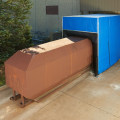 What parts of the compactor should you clean whenever the compactor is removed?